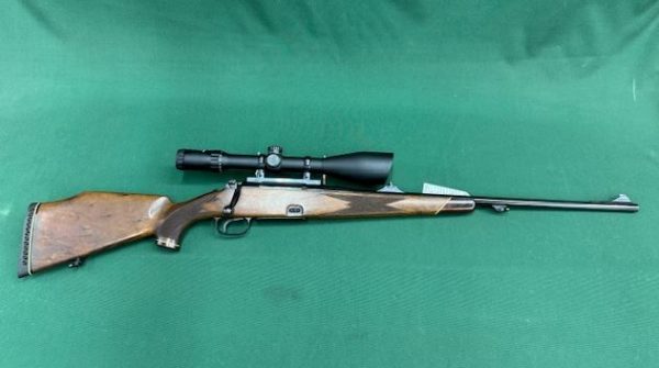 .375H&H MAUSER WERKE MODEL ''77'' BOLT ACTION BLUED WALNUT WITH 8-24X56 NIKKO SCOPE