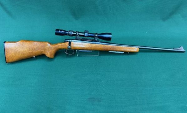 .243 REM MODEL ''788'' BOLT ACTION BLUED WOOD FITTED WITH 3-9X40 TASCO SCOPE